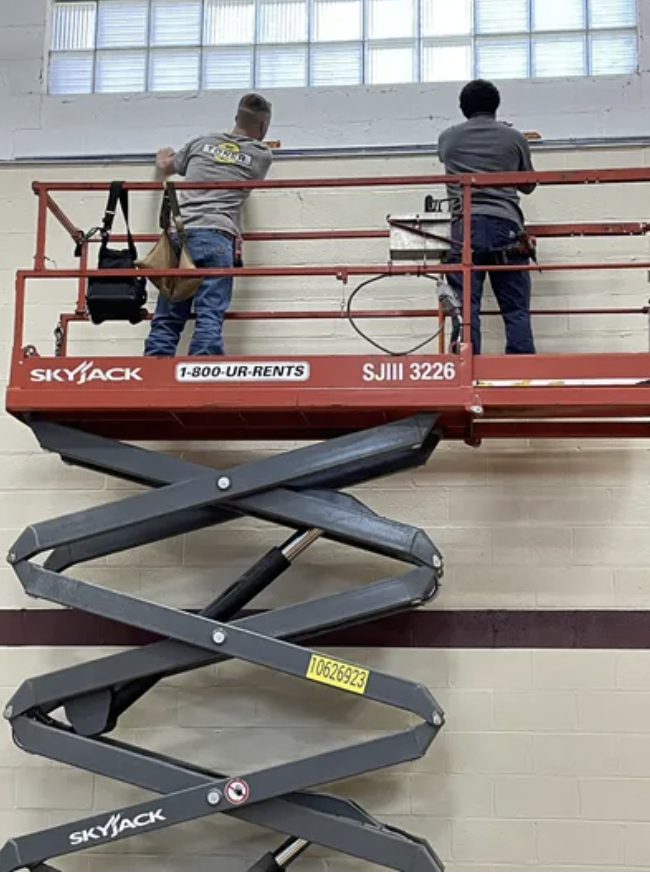 Scissor lift in use at job site